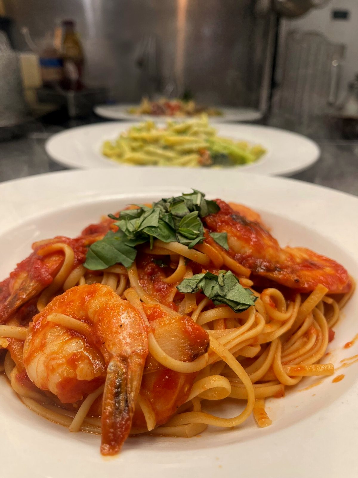 Shrimp fra diavolo over linguine with fresh basil at SOLO