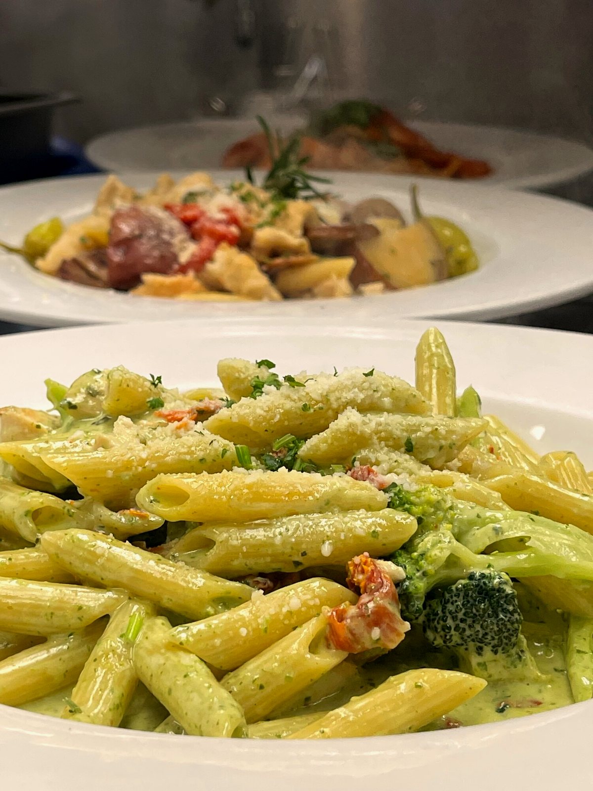 Creamy basil pesto penne with sun-dried tomatoes and broccoli at SOLO